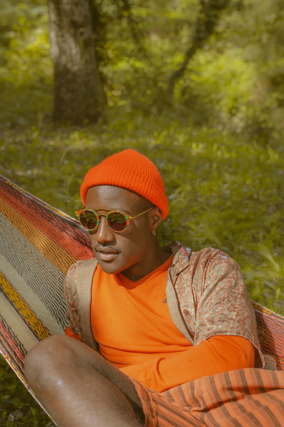 Man Relaxing in Hammock